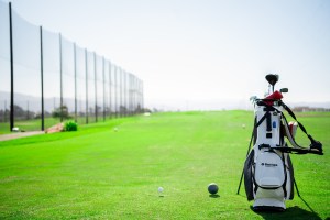 Golf club bag near range